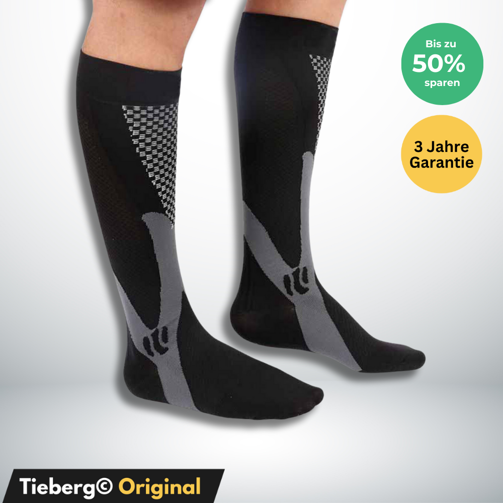 Tieberg™️ Spezial Kompressionsstrümpfe in Schwarz und Grau mit geometrischem Muster aus Lycra-Gewebe für Komfort. Grüner Kreis: Bis zu 50% sparen; gelb: 3 Jahre Garantie. Unten links: Tieberg™️ Original Branding.