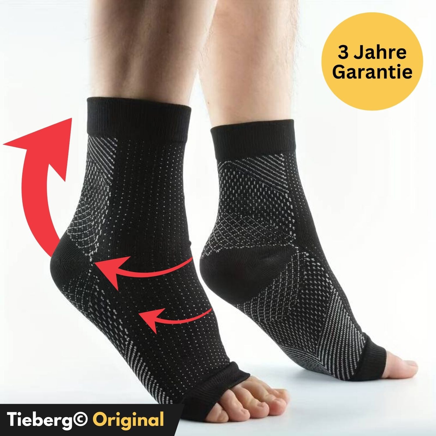 Zwei Füße in schwarzen, zehenoffenen Tieberg™️ Kompressionssocken mit weißen Pünktchen. Rote Pfeile markieren die Fuß- und Knöchelunterstützung. Ein gelber Kreis zeigt "3 Jahre Garantie". Unterer Text: Tieberg™️ Original.